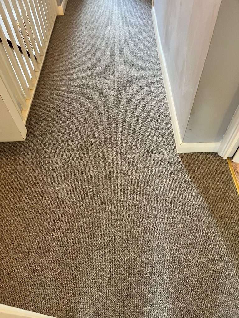 Landing and staircase supply and fit in Cormar’s Malabar loop pile carpet, colour Rhino
