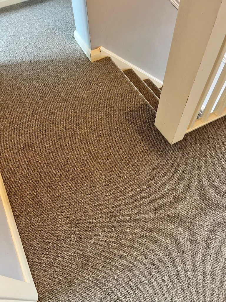 Landing and staircase supply and fit in Cormar’s Malabar loop pile carpet, colour Rhino 2