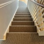 Landing and staircase supply and fit in Cormar’s Malabar loop pile carpet, colour Rhino 3