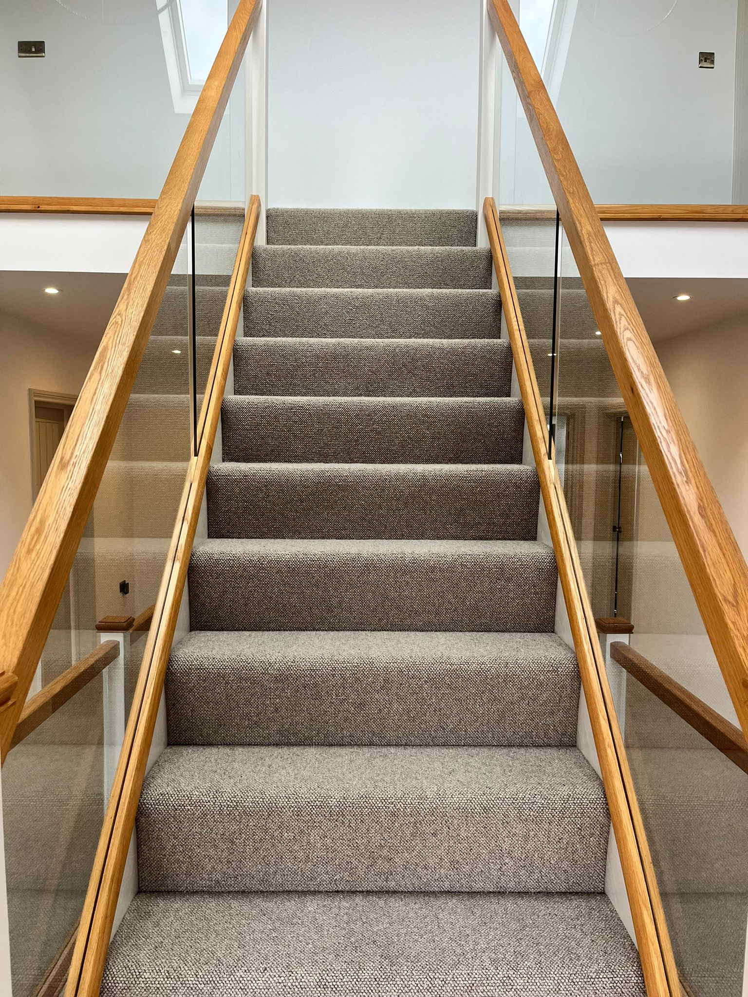 Large landing and two flights of stairs supplied + fitted