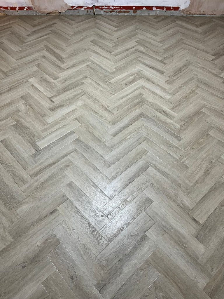 Tv room supplied and fitted in Textures LVT 04