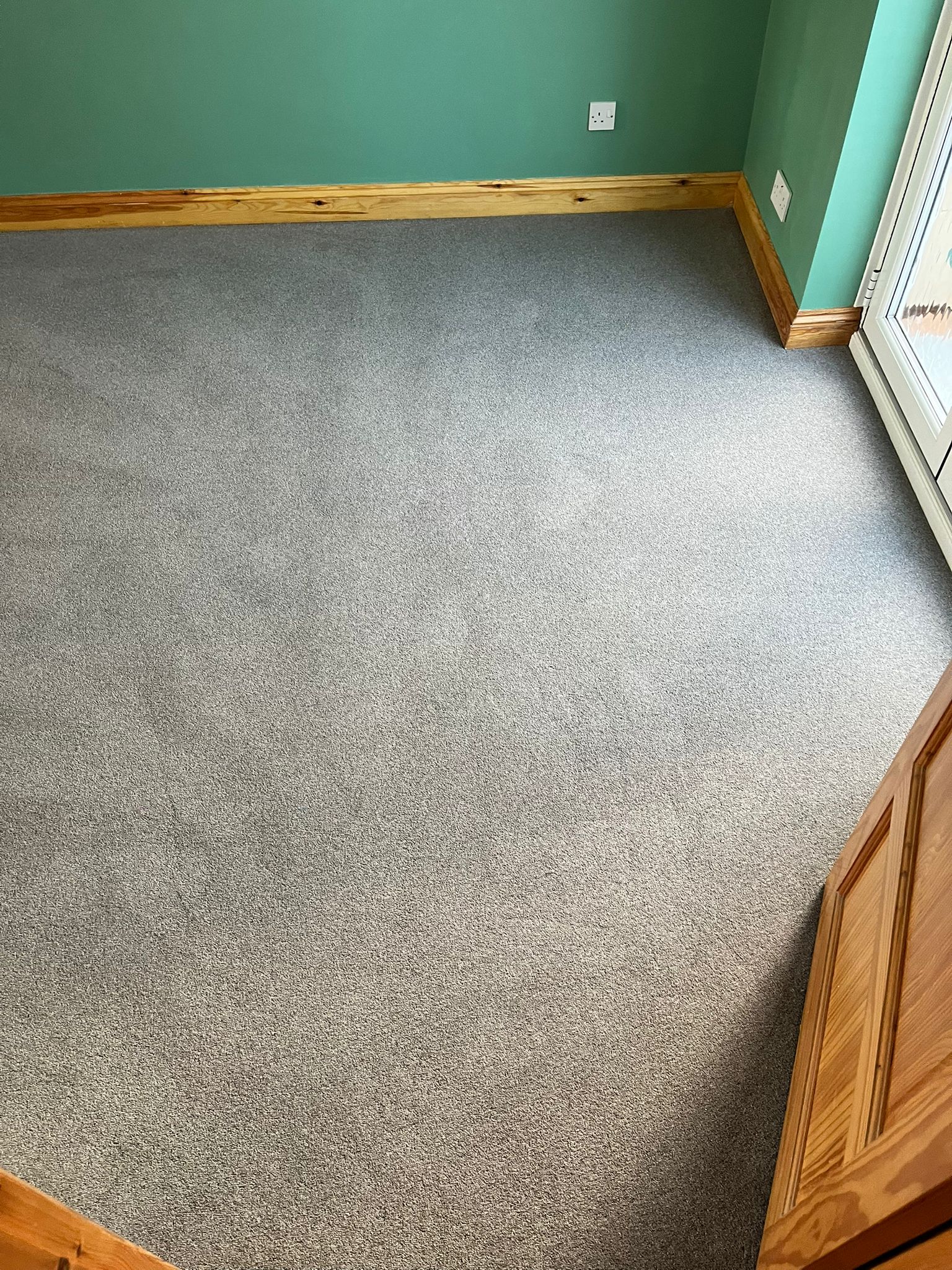 Dining room supplied and fitted in Cormar Carpets Woodland Heather Twist Deluxe.