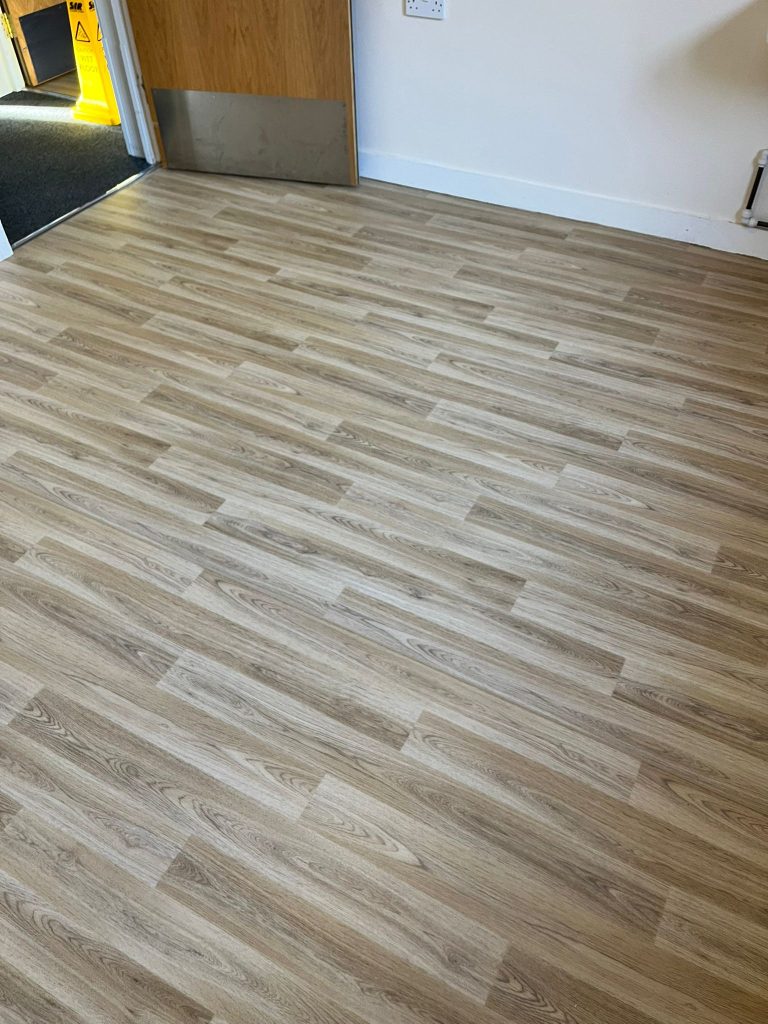 Nursing home residents room and sluice room supplied and fitted in Polysafe Wood FX safety flooring. Floor was prepared using a latex smoothing compound. Old floor was uplift and disposed of.