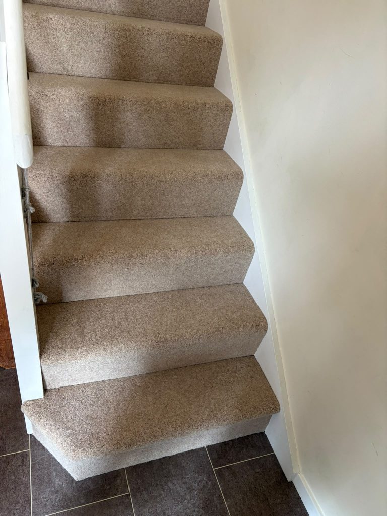 Stairs, landing and bedroom supplied and fitted in Cormar’s Woodland Heather Twist Deluxe carpet, colour Pine Nut 01