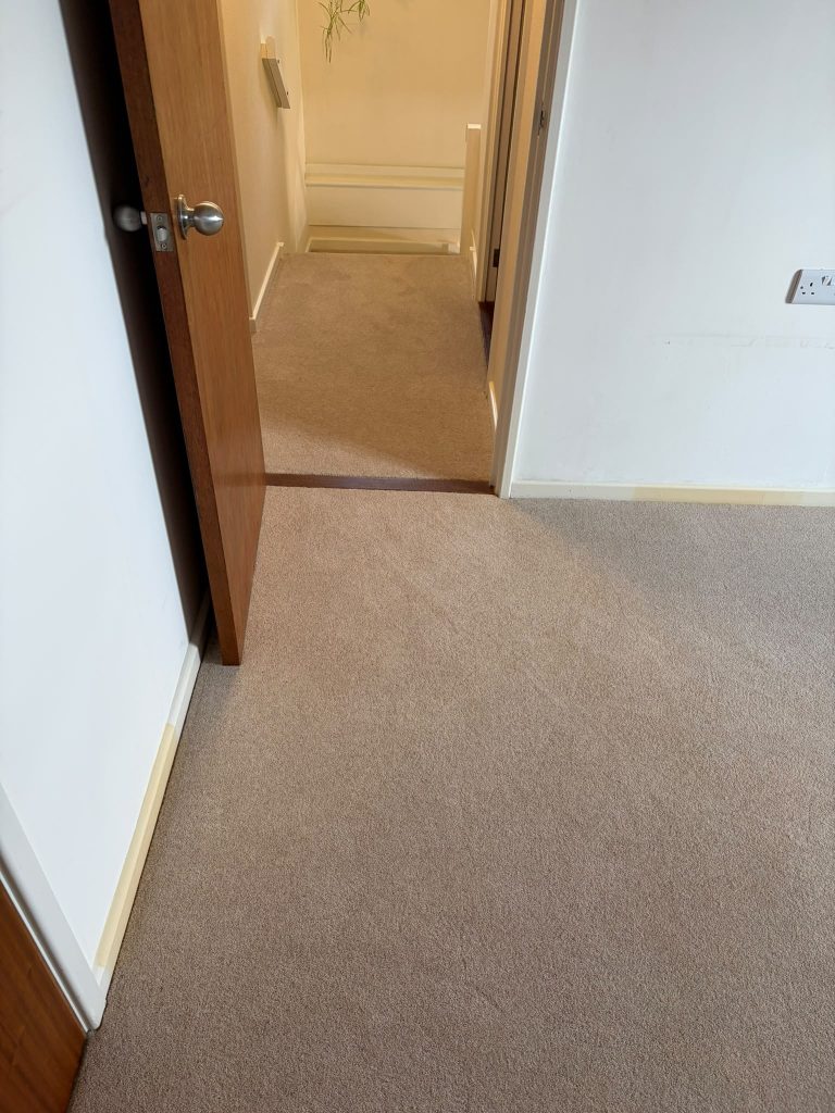 Stairs, landing and bedroom supplied and fitted in Cormar’s Woodland Heather Twist Deluxe carpet, colour Pine Nut 07