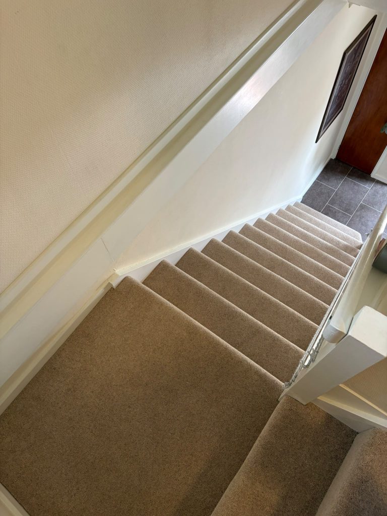 Stairs, landing and bedroom supplied and fitted in Cormar’s Woodland Heather Twist Deluxe carpet, colour Pine Nut 08